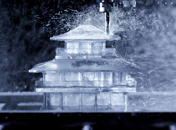 Finishing touches are applied to the temple shaped ice